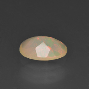 Opale naturale multicolore da 0,78 ct, taglio ovale, traslucido