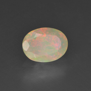 Opale naturale multicolore da 0,63 ct, taglio ovale, traslucido