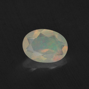 Opale naturale multicolore da 0,65 ct, taglio ovale, trasparente