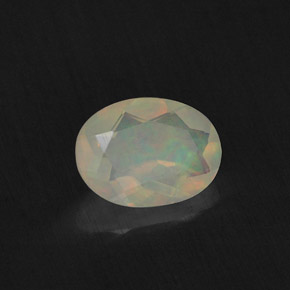 Opale naturale multicolore da 0,65 ct, taglio ovale, trasparente