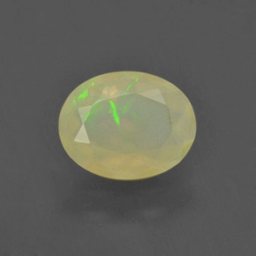 Opale naturale multicolore da 0,93 ct, taglio ovale, traslucido