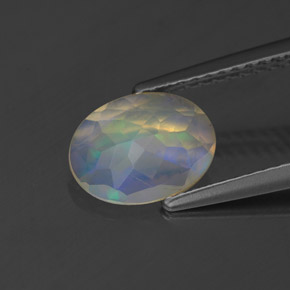 Opale naturale multicolore da 0,83 ct, taglio ovale, trasparente