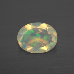 Opale naturale multicolore da 0,86 ct, taglio ovale, trasparente