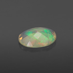 Opale naturale multicolore da 0,86 ct, taglio ovale, trasparente