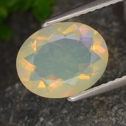 Opale naturale multicolore da 1,29 ct, taglio ovale, trasparente