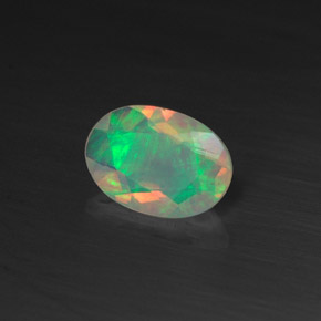 Opale naturale multicolore da 0,44 ct, taglio ovale, trasparente