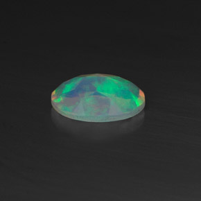 Opale naturale multicolore da 0,44 ct, taglio ovale, trasparente