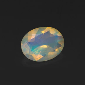 Opale naturale multicolore da 0,99 ct, taglio ovale, trasparente