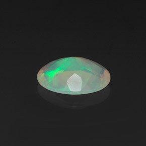 Opale naturale multicolore da 0,75 ct, taglio ovale, trasparente