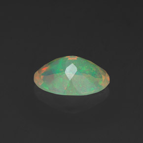 Opale naturale multicolore da 0,91 ct, taglio ovale, trasparente