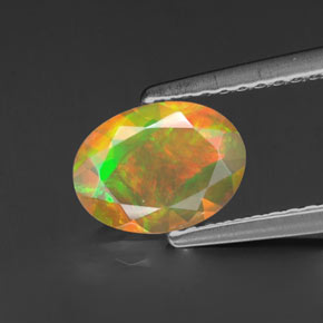 Opale naturale multicolore da 0,69 ct, taglio ovale, trasparente