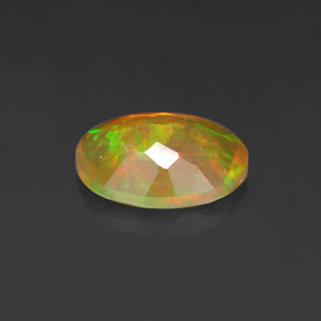 Opale naturale multicolore da 0,69 ct, taglio ovale, trasparente