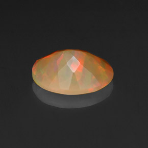 Opale naturale multicolore da 0,97 ct, taglio ovale, opaco