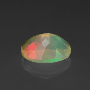 Opale naturale multicolore da 0,95 ct, taglio ovale, trasparente