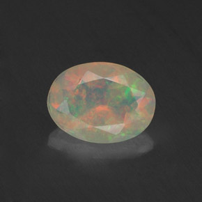 Opale naturale multicolore da 0,74 ct, taglio ovale, trasparente