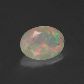 Opale naturale multicolore da 0,74 ct, taglio ovale, trasparente