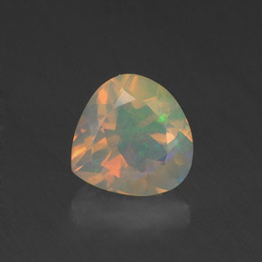Opale naturale multicolore da 0,84 ct, taglio a pera, trasparente