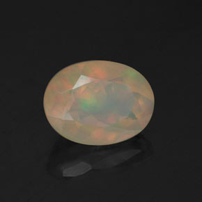 Opale naturale multicolore da 0,97 ct, taglio ovale, trasparente