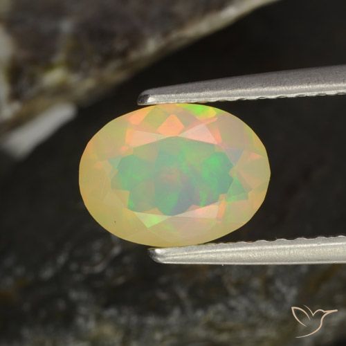 Opale naturale multicolore da 0,94 ct, taglio ovale, trasparente
