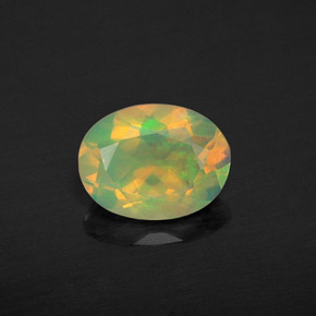 Opale naturale multicolore da 0,94 ct, taglio ovale, trasparente