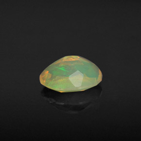 Opale naturale multicolore da 0,94 ct, taglio ovale, trasparente
