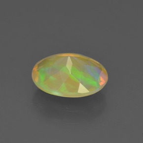 Opale naturale multicolore da 0,93 ct, taglio ovale, trasparente