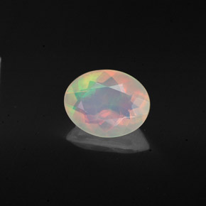 Opale naturale multicolore da 0,98 ct, taglio ovale, trasparente