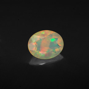 Opale naturale multicolore da 0,92 ct, taglio ovale, trasparente