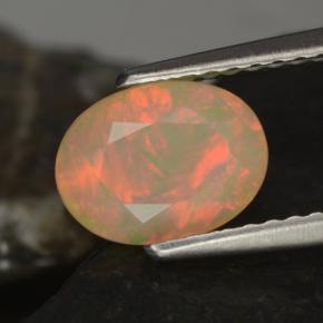 Opale naturale multicolore da 0,97 ct, taglio ovale, traslucido