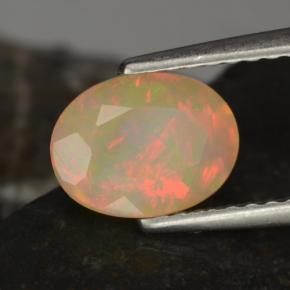 Opale naturale multicolore da 0,97 ct, taglio ovale, traslucido