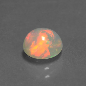 Opale naturale multicolore da 0,85 ct, taglio rotondo, trasparente