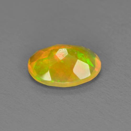 Opale naturale multicolore da 0,74 ct, taglio ovale, traslucido