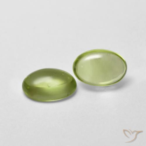 Gemme di Peridoto Verde caldo naturale da 0.95 ct, Ovale, Trasparente