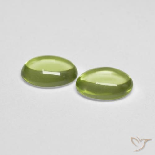 Gemme di Peridoto Verde caldo naturale da 0.95 ct, Ovale, Trasparente