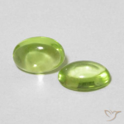 Gemme di Peridoto Verde giallastro vivace naturale da 0.92 ct, Ovale, Trasparente