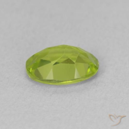 Peridoto Verde giallastro naturale da 0.90 ct, Ovale, VVS-VS