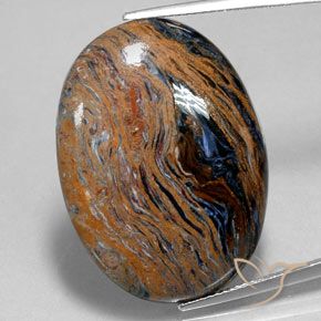 27.58ct Naturale Multicolore Pietersite, Ovale, Opaco