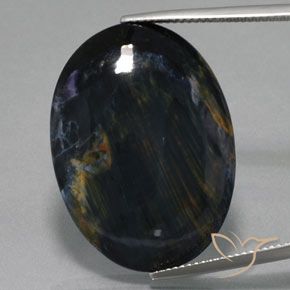 25.62ct Naturale Multicolore Pietersite, Ovale, Opaco
