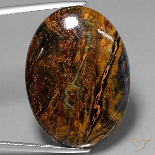 27.91ct Naturale Multicolore Pietersite, Ovale, Opaco