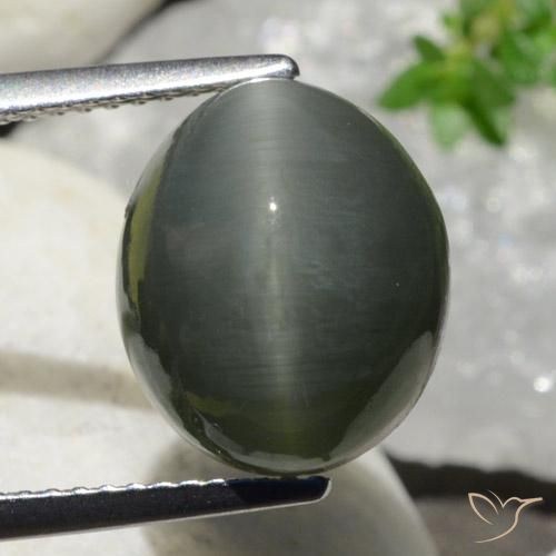 7.47ct Naturale Grigio scuro Quarzo effetto occhio di gatto, Ovale, Opaco