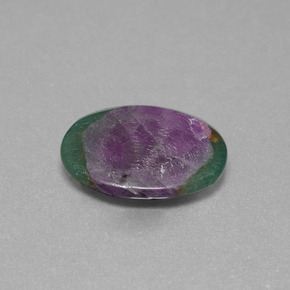Rubino in fuchsite naturale bicolore da 4,55 ct, taglio ovale, traslucido