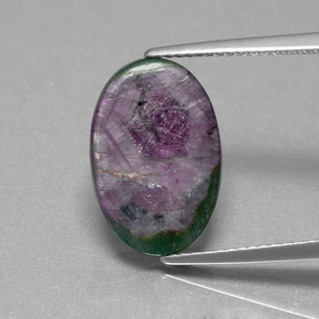 Rubino in fuchsite naturale multicolore da 6,33 ct, taglio ovale, traslucido