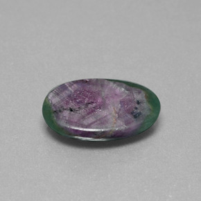 Rubino in fuchsite naturale multicolore da 6,33 ct, taglio ovale, traslucido