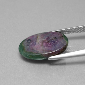 Rubino in fuchsite naturale multicolore da 6,33 ct, taglio ovale, traslucido