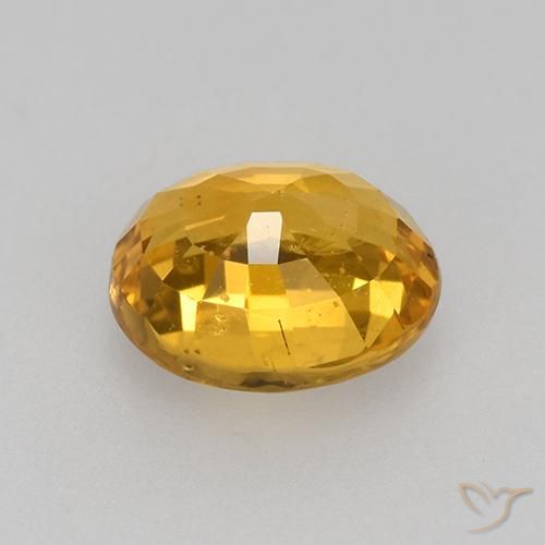 Zaffiro Arancio Dorato Profondo naturale da 0.77 ct, Ovale, VVS-VS