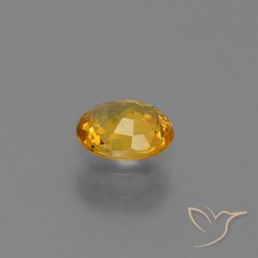 Zaffiro Arancio Scuro-Oro naturale da 0.73 ct, Ovale, VS