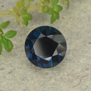 Zaffiro Blu nerastro naturale da 0.63 ct, Rotondo, VVS-VS