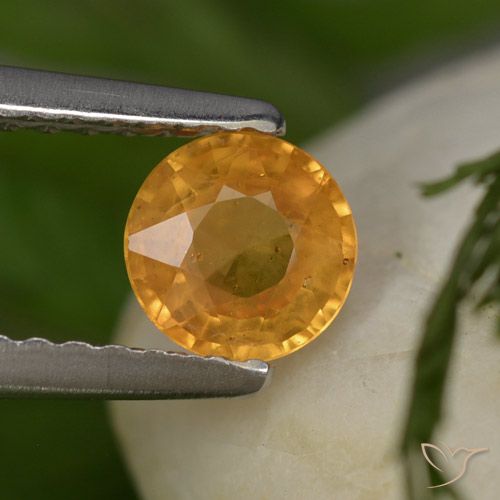 0.58ct Naturale Arancio intenso-OroG Zaffiro, Rotondo, VS