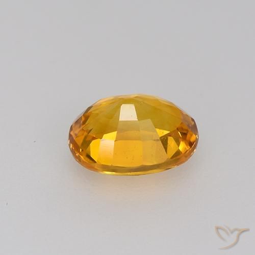 Zaffiro Arancio intenso-OroG naturale da 0.81 ct, Ovale, VVS