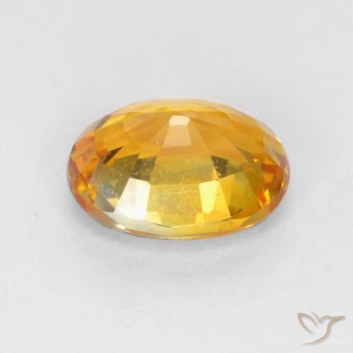 Zaffiro Arancio intenso-OroG naturale da 0.59 ct, Ovale, VVS-VS